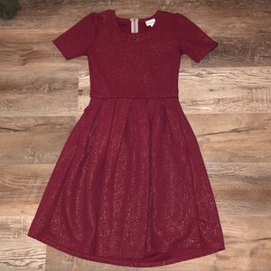 Red dress with a golden metallic look